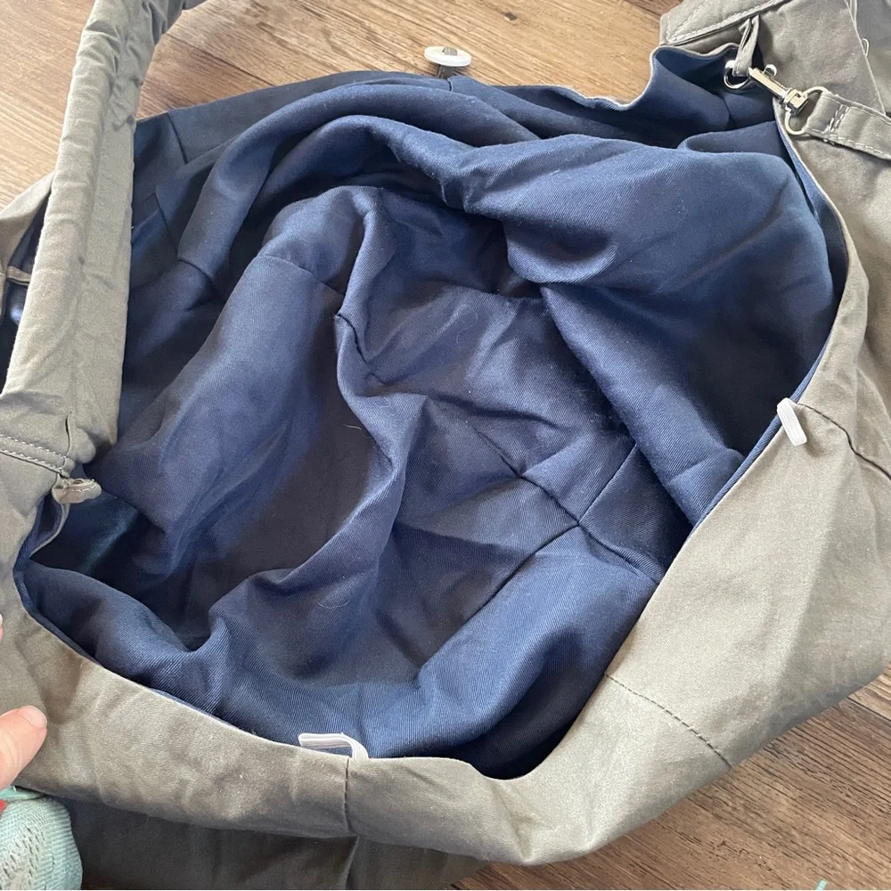 Slow pet, dog or cat sling carrier
